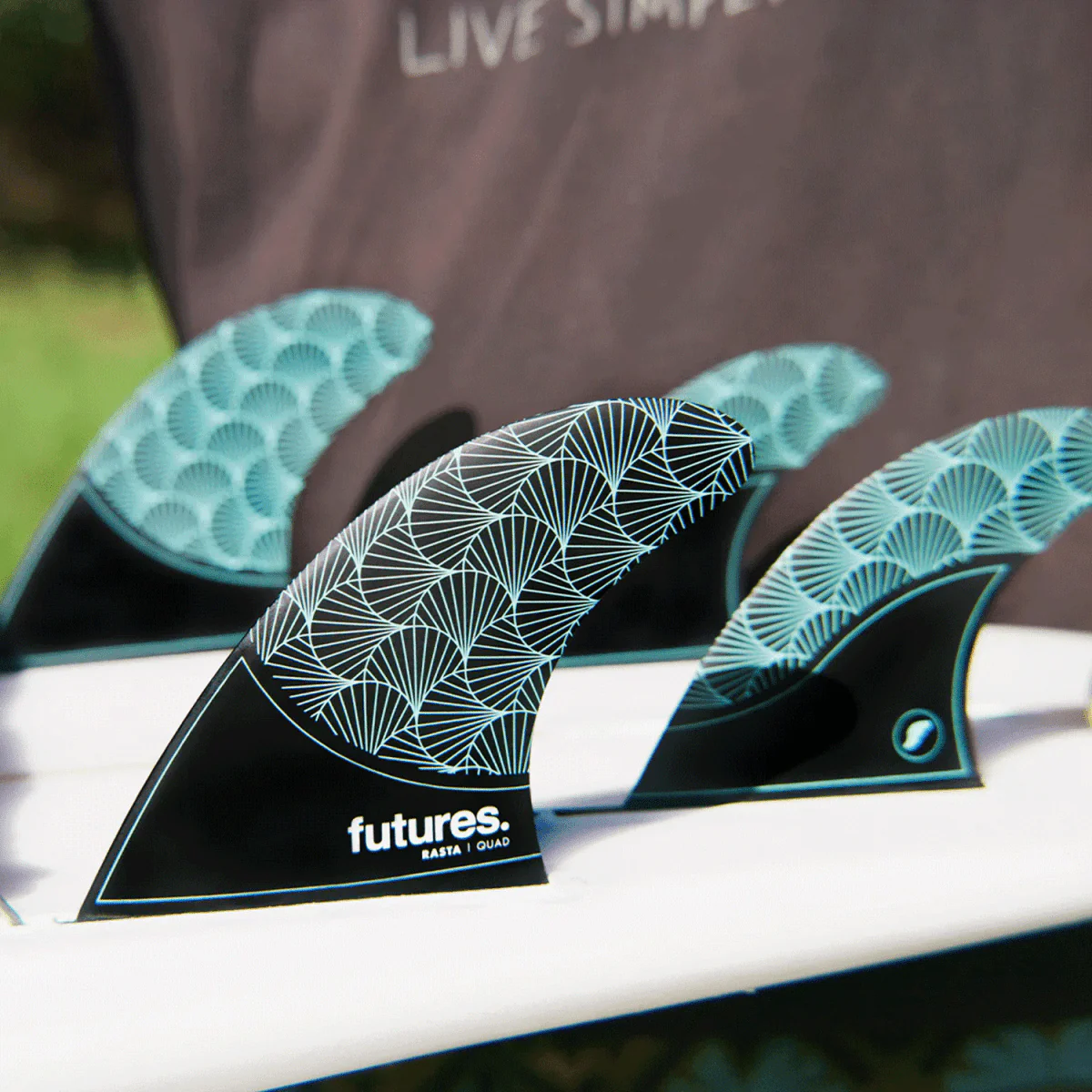 Futures Rasta Quad Honeycomb/Carbon Black/Teal Surf Fins - Image 2